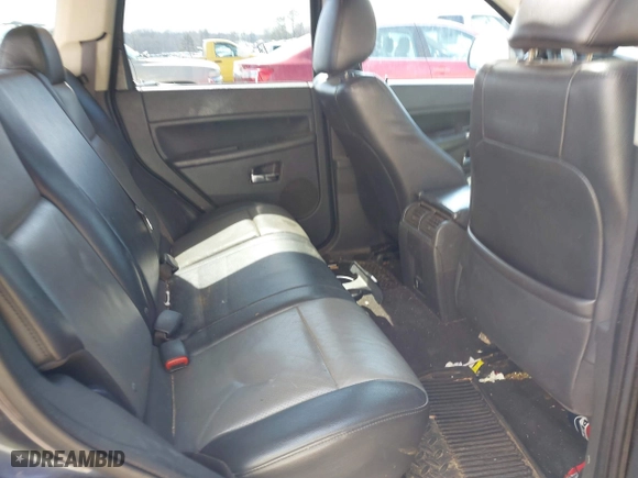 2010 Jeep Grand Cherokee Laredo with VIN 1J4PS4GK0AC112654, listed as a IAAI auction lot 41809445 with 418,301 mi miles. Bid and sale history available at carsss.com. Image 8.