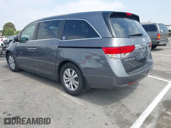 2014 Honda Odyssey EX-L with VIN 5FNRL5H64EB026520, listed as a IAAI auction lot 42562290 with 118,890 mi miles and . Bid and sale history available at DreamBid. Image 3.