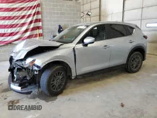 2020 Mazda CX-5 Touring with VIN JM3KFBCM6L0790627, listed as a Copart auction lot 53357955 with 89,435 mi miles and Salvage Title. Bid and sale history available at DreamBid. Image 1.