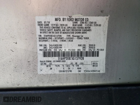 2018 Ford Taurus SEL with VIN 1FAHP2E87JG137928, listed as a Copart auction lot 53438695 with 56,874 mi miles and Salvage title. Bid and sale history available at DreamBid. Image 12.