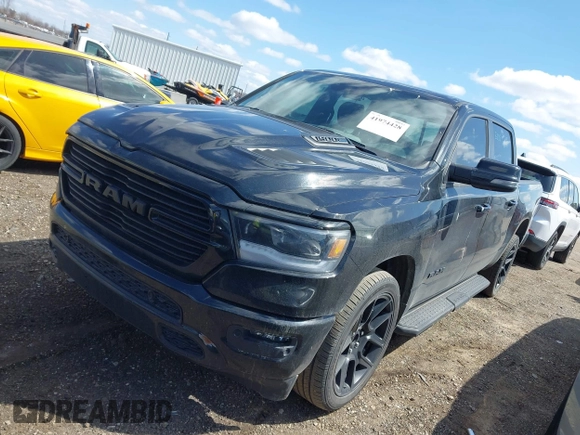 2023 Ram 1500 Laramie with VIN 1C6SRFJT6PN542105, listed as a IAAI auction lot 41974428 with 74,489 mi miles and . Bid and sale history available at DreamBid. Image 2.