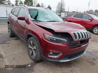 2020 Jeep Cherokee Limited with VIN 1C4PJLDB0LD570909, listed as a IAAI auction lot 41293813 with 61,492 mi miles. Bid and sale history available at carsss.com. Image 1.