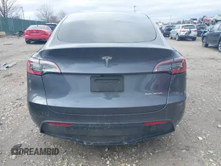 2023 Tesla Model Y Long Range with VIN 7SAYGDEE6PF824173, listed as a IAAI auction lot 41728613 with Not Provided miles and . Bid and sale history available at DreamBid. Image 16.