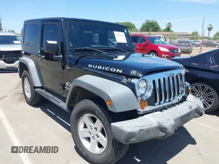 2008 Jeep Wrangler X z VIN 1J4FA24178L517113, wystawiony jako IAAI lot #42347046 z przebiegiem 89 954 mil mil oraz . Historia ofert i sprzedaży dostępna na DreamBid. Obrazek 1.