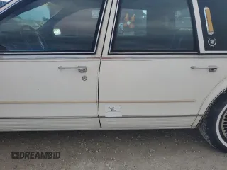1987 Cadillac Seville z VIN 1G6KS518XHU812739, wystawiony jako Copart lot #79308574 z przebiegiem Nie podano mil oraz Szkoda całkowita • Salvage title. Historia ofert i sprzedaży dostępna na DreamBid. Obrazek 12.