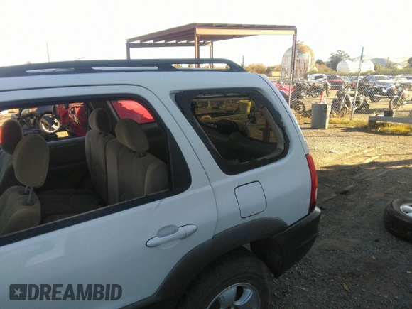 2003 Mazda Tribute LX with VIN 4F2YZ04153KM18168, listed as a IAAI auction lot 39240269 with 225,859 mi miles and . Bid and sale history available at DreamBid. Image 6.