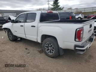 2021 GMC Canyon 4WD AT4 w/Cloth with VIN 1GTG6FEN9M1117578, listed as a Copart auction lot 78047114 with 64,955 mi miles and Salvage Title. Bid and sale history available at carsss.com. Image 2.