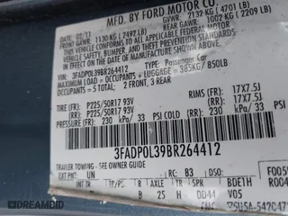 2011 Ford Fusion Hybrid with VIN 3FADP0L39BR264412, listed as a IAAI auction lot 42038511 with 134,166 mi miles. Bid and sale history available at carsss.com. Image 9.