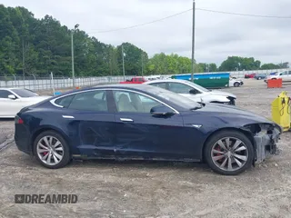 2014 Tesla Model S 60 z VIN 5YJSA1H17EFP33860, wystawiony jako IAAI lot #42471432 z przebiegiem 142 045 mil mil oraz . Historia ofert i sprzedaży dostępna na DreamBid. Obrazek 14.