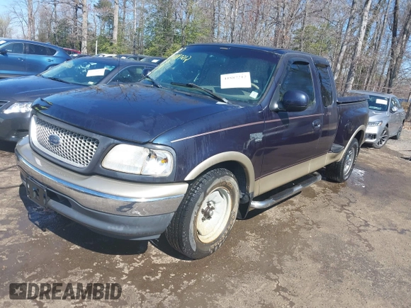 1999 Ford F-150 XL with VIN 2FTRX07L3XCA60067, listed as a IAAI auction lot 41887212 with 176,034 mi miles. Bid and sale history available at carsss.com. Image 17.