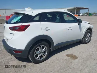 2016 Mazda CX-3 Touring with VIN JM1DKBC71G0126040, listed as a IAAI auction lot 41860285 with 97,986 mi miles and . Bid and sale history available at DreamBid. Image 4.