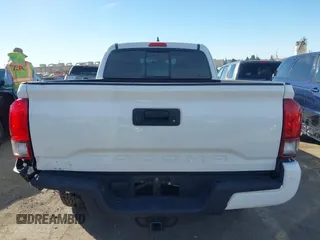 2018 Toyota Tacoma SR with VIN 5TFRX5GN9JX106232, listed as a IAAI auction lot 41634120 with 66,674 mi miles and . Bid and sale history available at DreamBid. Image 16.