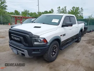 2016 Ram 1500 Rebel with VIN 1C6RR7YTXGS417801, listed as a IAAI auction lot 42382016 with 142,636 mi miles and . Bid and sale history available at DreamBid. Image 2.