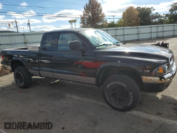 1999 Dodge Dakota SLT with VIN 1B7GG22Y5XS107729, listed as a Copart auction lot 79440034 with 163,718 mi miles and Salvage Title. Bid and sale history available at DreamBid. Image 4.