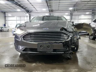2019 Ford Fusion Hybrid SE with VIN 3FA6P0LU9KR287187, listed as a Copart auction lot 52704565 with 52,543 mi miles and Salvage Title. Bid and sale history available at carsss.com. Image 5.