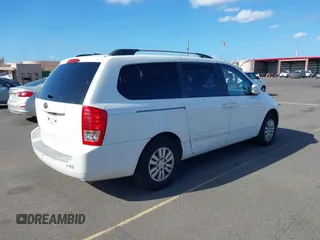 2011 Kia Sedona LX with VIN KNDMG4C77B6376157, listed as a IAAI auction lot 41787592 with 126,932 mi miles. Bid and sale history available at carsss.com. Image 4.