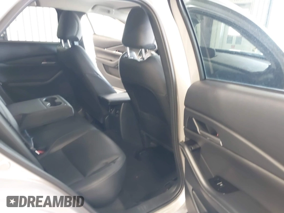 2024 Mazda CX-30 S Select Sport with VIN 3MVDMBBM0RM698491, listed as a IAAI auction lot 42609161 with 21,576 mi miles and . Bid and sale history available at DreamBid. Image 8.