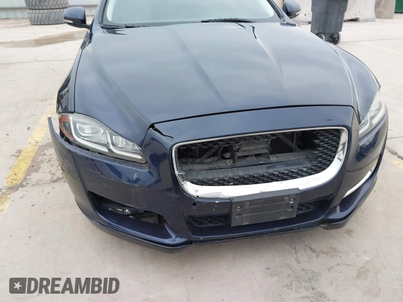 2018 Jaguar XJ R-Sport with VIN SAJWA1C74J8W14026, listed as a IAAI auction lot 42032719 with 95,263 mi miles and . Bid and sale history available at DreamBid. Image 6.