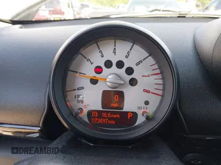 2014 MINI Countryman S z VIN WMWZC5C52EWP39083, wystawiony jako IAAI lot #42409957 z przebiegiem 73 497 mil mil oraz . Historia ofert i sprzedaży dostępna na DreamBid. Obrazek 7.