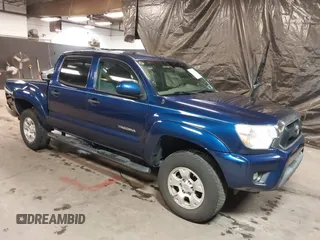 2014 Toyota Tacoma with VIN 3TMLU4EN4EM156933, listed as a IAAI auction lot 41197904 with 128,183 mi miles. Bid and sale history available at carsss.com. Image 1.