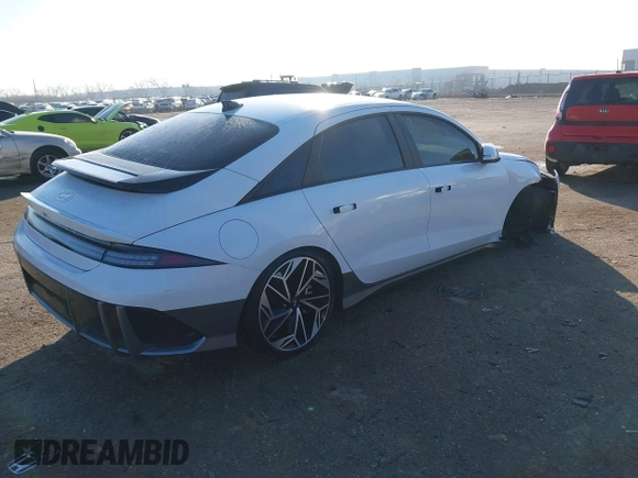 2023 Hyundai Ioniq 6 SEL z VIN KMHM34AA6PA052093, wystawiony jako IAAI lot #41233794 z przebiegiem 8 300 mil mil oraz . Historia ofert i sprzedaży dostępna na DreamBid. Obrazek 4.