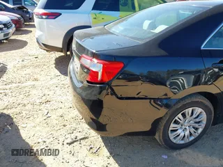 2014 Toyota Camry L with VIN 4T4BF1FK8ER444573, listed as a IAAI auction lot 41815381 with 162,662 mi miles. Bid and sale history available at carsss.com. Image 6.