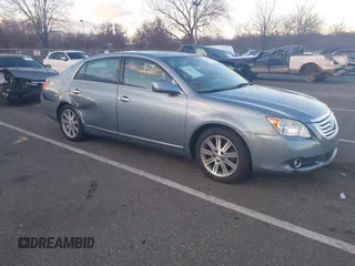 2010 Toyota Avalon XL with VIN 4T1BK3DB1AU363817, listed as a IAAI auction lot 41010053 with 259,106 mi miles and . Bid and sale history available at carsss.com. Image 1.