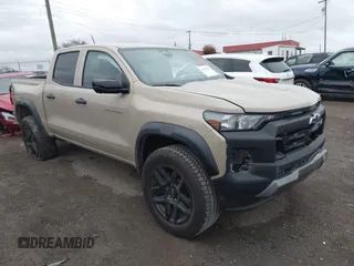 2023 Chevrolet Colorado 4WD Trail Boss with VIN 1GCPTEEK8P1239877, listed as a IAAI auction lot 40893691 with 30,617 mi miles. Bid and sale history available at carsss.com. Image 1.