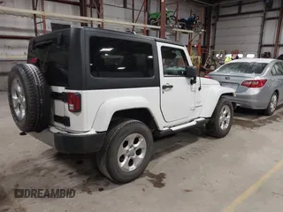 2014 Jeep Wrangler Sahara with VIN 1C4AJWBG7EL234625, listed as a IAAI auction lot 41726770 with 128,080 mi miles and . Bid and sale history available at DreamBid. Image 4.