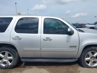 2013 Chevrolet Tahoe LT with VIN 1GNSCBE09DR357304, listed as a IAAI auction lot 42361887 with 96,229 mi miles and . Bid and sale history available at DreamBid. Image 14.
