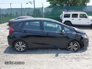2015 Honda Fit EX-L z VIN 3HGGK5H85FM721566, wystawiony jako IAAI lot #42423777 z przebiegiem 138 825 mil mil oraz . Historia ofert i sprzedaży dostępna na DreamBid. Obrazek 14.