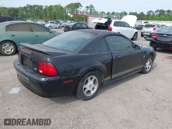 2000 Ford Mustang with VIN 1FAFP4048YF163834, listed as a IAAI auction lot 42090407 with 161,928 mi miles. Bid and sale history available at carsss.com. Image 4.