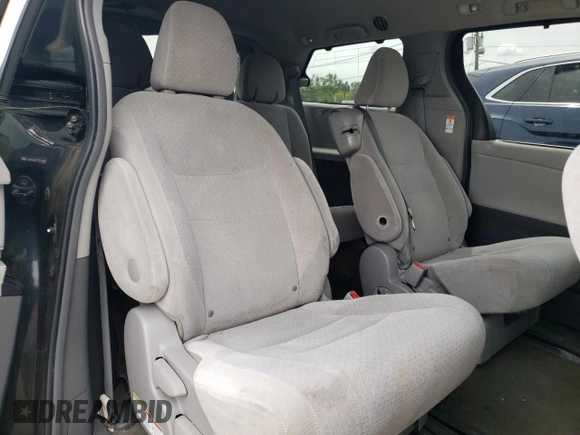 2015 Toyota Sienna LE AAS z VIN 5TDKK3DCXFS541460, wystawiony jako Copart lot #58171725 z przebiegiem 192 174 mil mil oraz Szkoda całkowita • Salvage title. Historia ofert i sprzedaży dostępna na DreamBid. Obrazek 11.