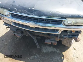 2004 Chevrolet Tahoe LS with VIN 1GNEC13T04R156427, listed as a IAAI auction lot 42333312 with 303,040 mi miles and . Bid and sale history available at DreamBid. Image 6.