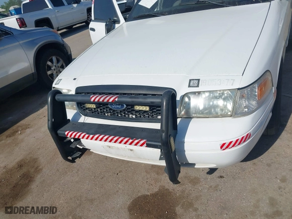 2011 Ford Police Interceptor with VIN 2FABP7BV3BX181983, listed as a IAAI auction lot 42010851 with 101,737 mi miles. Bid and sale history available at carsss.com. Image 6.