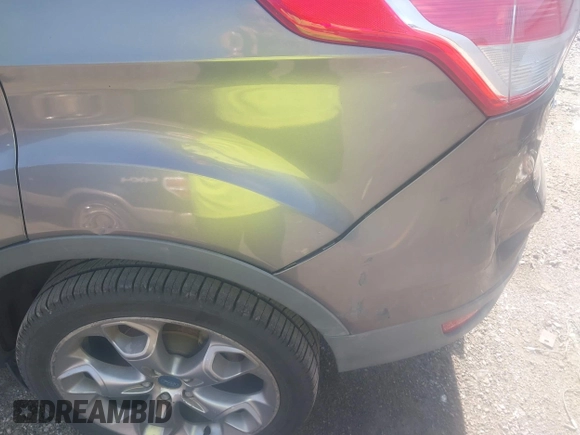 2013 Ford Escape Titanium with VIN 1FMCU0J92DUB36428, listed as a IAAI auction lot 42144682 with 263,600 mi miles and . Bid and sale history available at carsss.com. Image 15.
