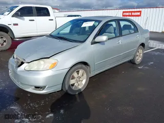 2004 Toyota Corolla CE with VIN 1NXBR38E34Z277929, listed as a IAAI auction lot 41807213 with 197,757 mi miles. Bid and sale history available at carsss.com. Image 18.