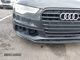 2014 Audi A6 Prestige with VIN WAUHGAFC6EN141698, listed as a IAAI auction lot 42330033 with 174,401 mi miles and . Bid and sale history available at DreamBid. Image 6.