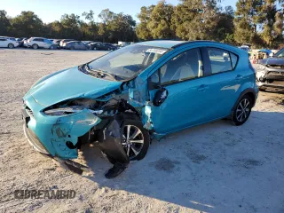 2019 Toyota Prius L z VIN JTDKDTB33K1623289, wystawiony jako Copart lot #84708234 z przebiegiem 23 559 mil mil oraz Szkoda całkowita • Salvage title. Historia ofert i sprzedaży dostępna na DreamBid. Obrazek 1.