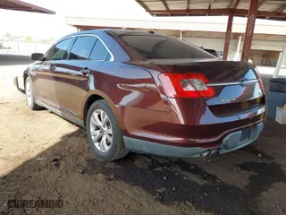 2010 Ford Taurus SEL with VIN 1FAHP2EWXAG142801, listed as a IAAI auction lot 41950232 with 154,916 mi miles. Bid and sale history available at carsss.com. Image 3.
