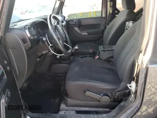 2018 Jeep Wrangler Willys Wheeler W z VIN 1C4AJWAGXJL852498, wystawiony jako Copart lot #52866945 z przebiegiem 90 515 mil mil oraz Szkoda całkowita • Salvage title. Historia ofert i sprzedaży dostępna na DreamBid. Obrazek 7.