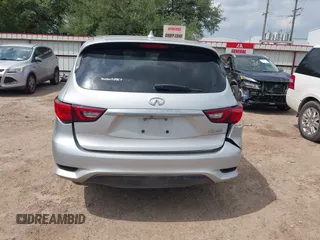 2019 Infiniti QX60 Luxe with VIN 5N1DL0MN0KC511333, listed as a IAAI auction lot 42070088 with 117,796 mi miles and . Bid and sale history available at DreamBid. Image 16.