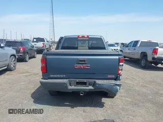 2014 GMC Sierra 1500 SLT with VIN 3GTU2VEC9EG188869, listed as a IAAI auction lot 41876520 with 147,367 mi miles and . Bid and sale history available at DreamBid. Image 16.