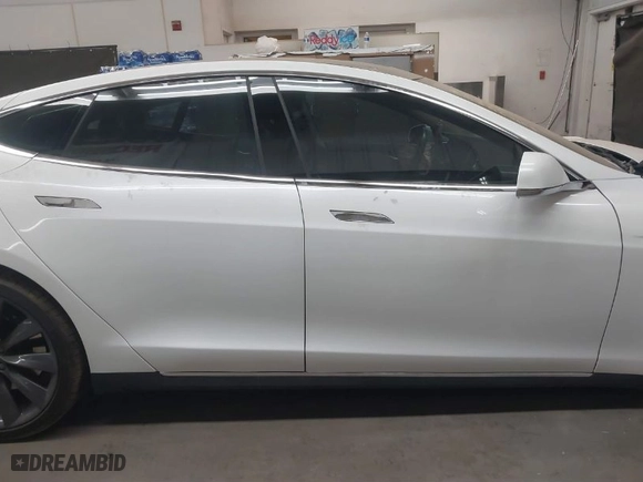 2014 Tesla Model S P85D with VIN 5YJSA1H23EFP63785, listed as a IAAI auction lot 41872168 with 118,248 mi miles. Bid and sale history available at carsss.com. Image 14.