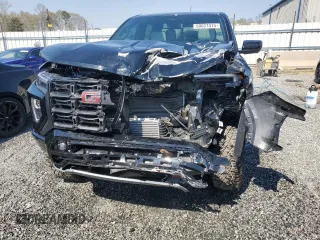 2024 GMC Canyon 4WD AT4X with VIN 1GTP6EEK7R1222174, listed as a Copart auction lot 50627415 with 2,642 mi miles and Salvage Title. Bid and sale history available at carsss.com. Image 7.