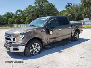 2018 Ford F-150 XL with VIN 1FTEW1CG4JKC38569, listed as a Copart auction lot 54779805 with 97,190 mi miles and Salvage Title. Bid and sale history available at carsss.com. Image 1.