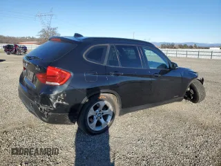 2015 BMW X1 sDrive28i with VIN WBAVM1C52FV315768, listed as a Copart auction lot 44970185 with 117,045 mi miles and Salvage Title. Bid and sale history available at carsss.com. Image 3.