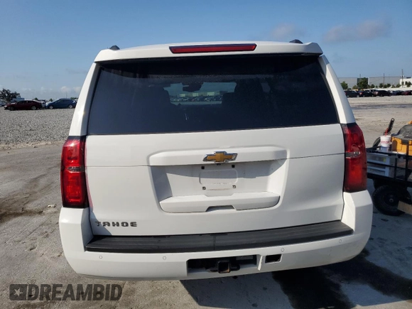 2016 Chevrolet Tahoe LT with VIN 1GNSKBKC7GR243372, listed as a Copart auction lot 55021225 with 170,808 mi miles and Salvage title. Bid and sale history available at DreamBid. Image 6.