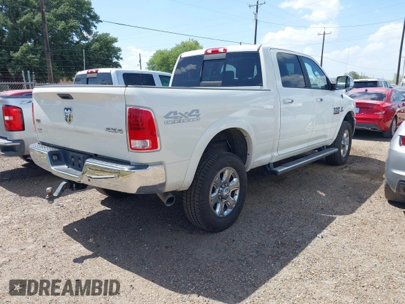 2018 Ram 2500 Laramie with VIN 3C6UR5FL0JG329369, listed as a IAAI auction lot 42539876 with 36,872 mi miles and . Bid and sale history available at DreamBid. Image 4.
