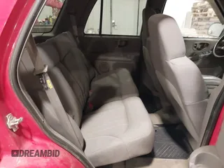 2004 Chevrolet Blazer LS z VIN 1GNDT13X34K157353, wystawiony jako IAAI lot #41089017 z przebiegiem 104 539 mil mil oraz . Historia ofert i sprzedaży dostępna na DreamBid. Obrazek 8.